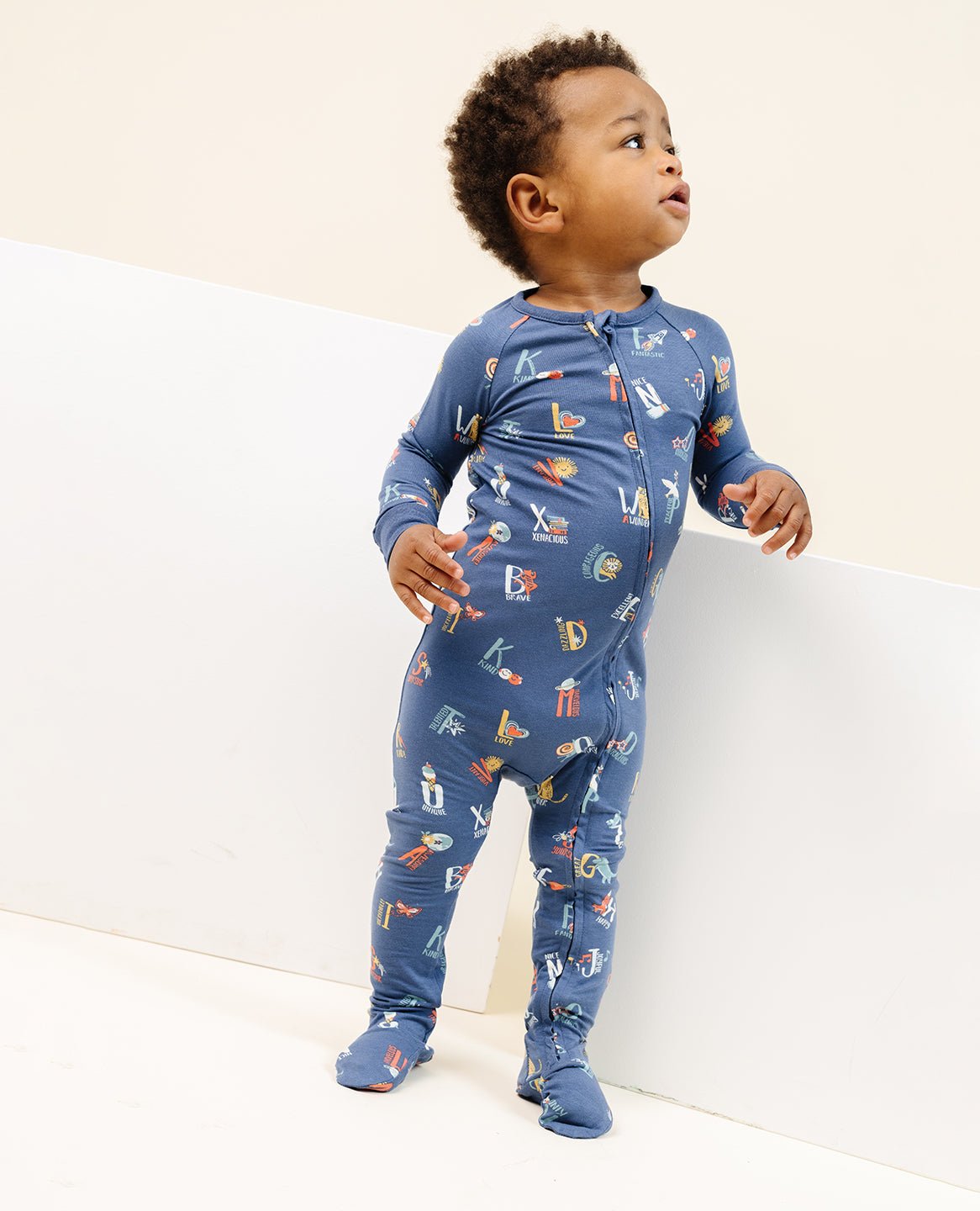 ultimate-zip-footie-in-good-vibes-abc-navy 1
