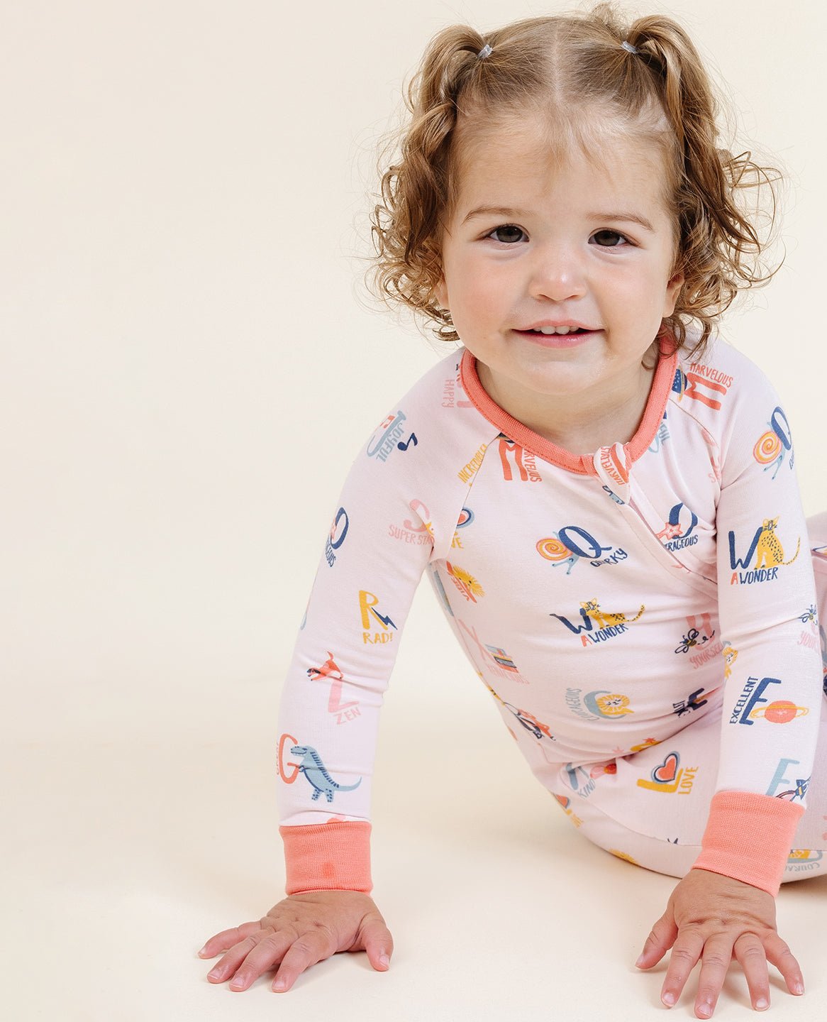 ultimate-zip-footie-in-good-vibes-abc-pink 2