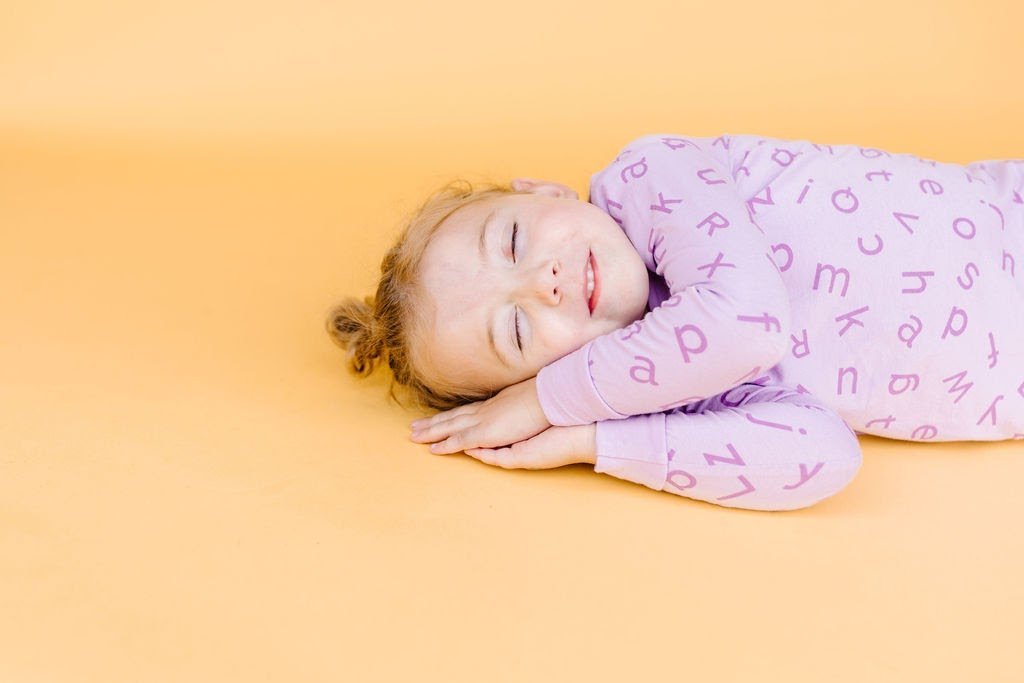 How to Survive the Two-to-One Nap Transition with Your Toddler - Wear Lark